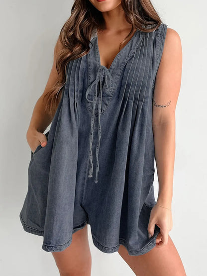 Light-blue tied romper with pockets from Trendsi, featuring a relaxed fit and casual style, suitable for warm weather.