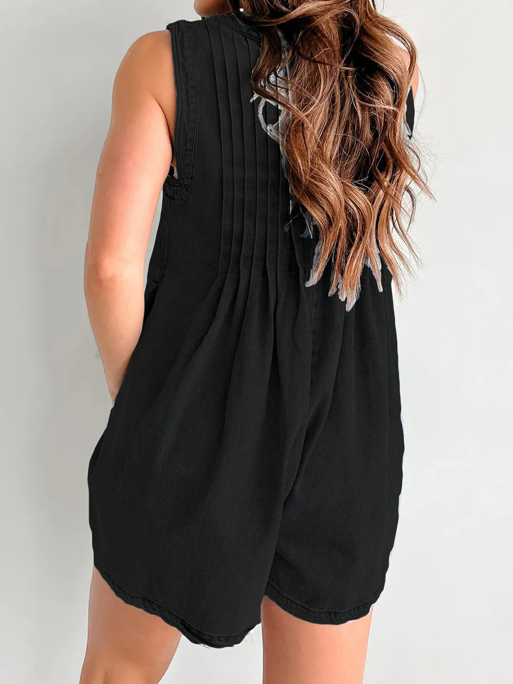 Light blue tied romper with pockets from Trendsi, featuring a relaxed fit and stylish design perfect for casual wear.