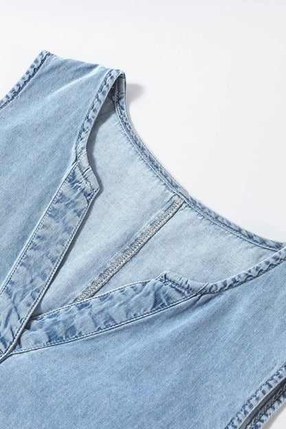 Light blue sleeveless mini denim dress with notched neckline by Trendsi, showcasing a casual, stylish fit.