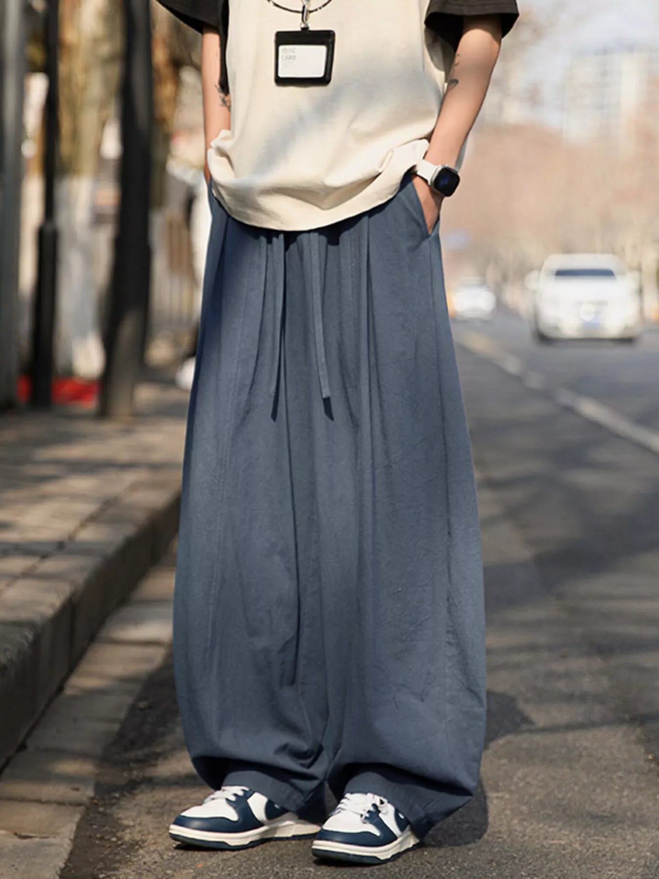 Light gray men's plus size loose fit wide leg pants by Trendsi, showing relaxed fit and comfortable wide silhouette.