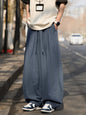 Light gray men's plus size loose fit wide leg pants by Trendsi, showing relaxed fit and comfortable wide silhouette.