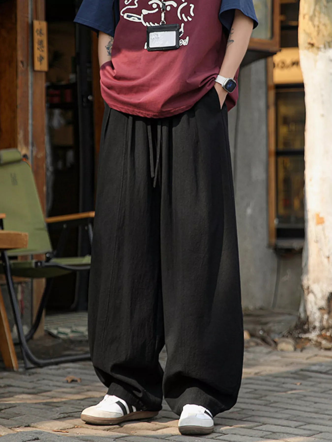 Light gray men's plus size loose fit wide leg pants by Trendsi, showing relaxed fit and comfortable wide-leg design.