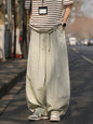 Light gray men's plus size loose fit wide leg pants by Trendsi, featuring a relaxed style and comfortable fit.