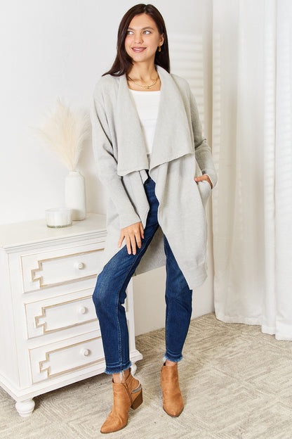 Light gray angel wings open front duster cardigan with pockets, by Trendsi, featuring a relaxed fit and cozy style.