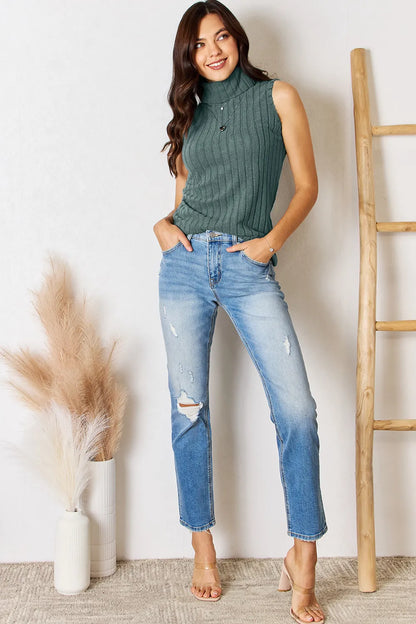 Light gray Trendsi Basic Bae full-size ribbed turtleneck tank top displayed on a hanger, showcasing its fitted design and ribbed texture.