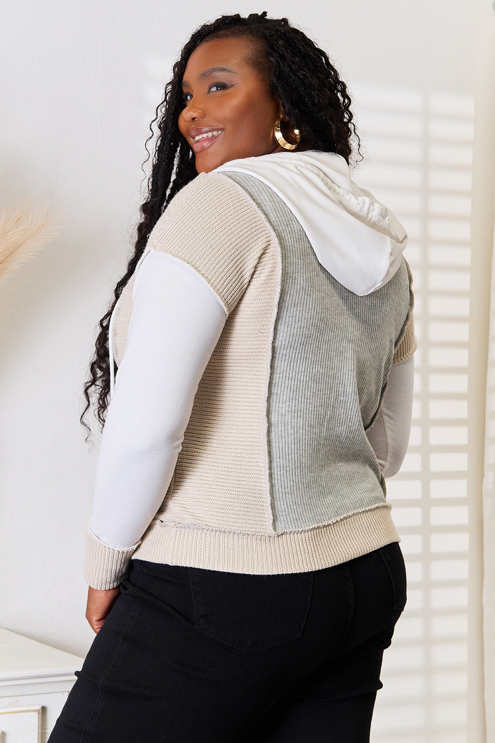 Light gray Trendsi Double Take color block hoodie with exposed seams and drawstring hood, casual and stylish for everyday wear.