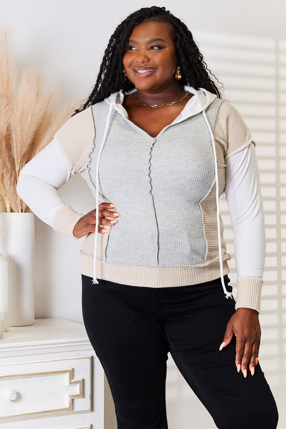 Light gray Trendsi Double Take color block hoodie with exposed seams and drawstring hood, casual and stylish for everyday wear.