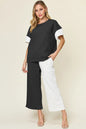 Light gray Trendsi Double Take full-size textured contrast T-shirt with matching wide-leg pants set, casual and stylish.