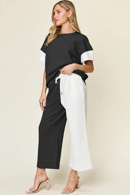 Light gray Trendsi Double Take full-size T-shirt and wide-leg pants set with textured contrast fabric, casual and stylish.