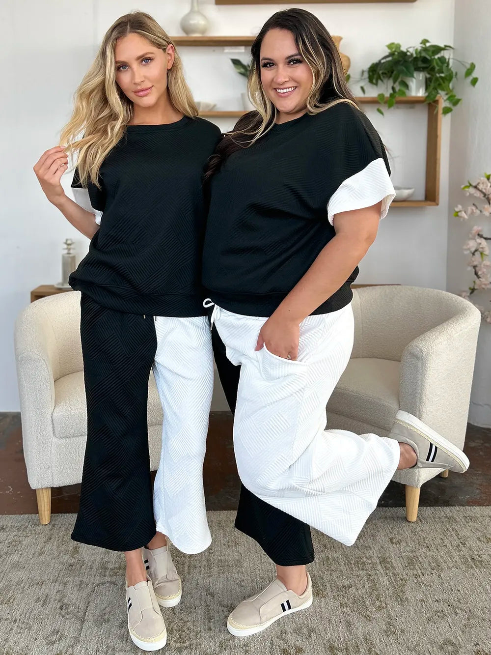 Light gray Trendsi Double Take full-size texture contrast T-shirt and wide-leg pants set on a model.