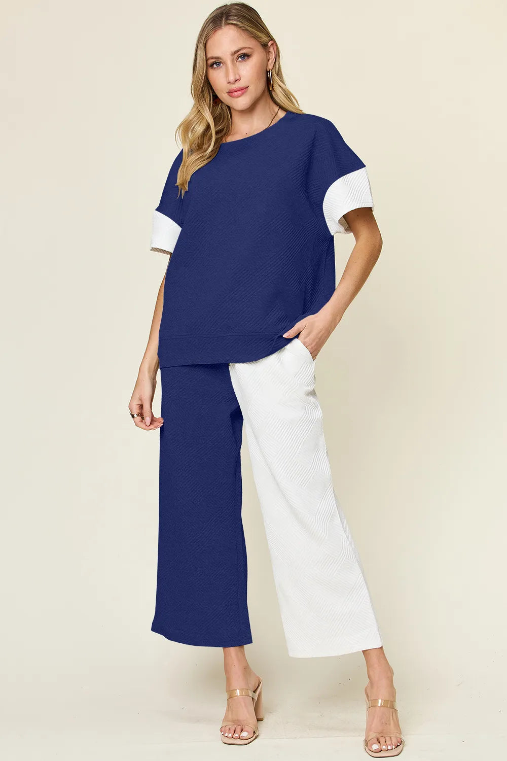 Light gray Trendsi double take full-size texture contrast T-shirt and wide-leg pants set, featuring stylish fabric details and relaxed fit.