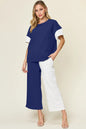 Light gray Trendsi double take full-size texture contrast T-shirt and wide-leg pants set, featuring stylish fabric details and relaxed fit.
