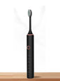 Light green Trendsi electric toothbrush with multiple brushing modes, featuring a sleek design and ergonomic handle.