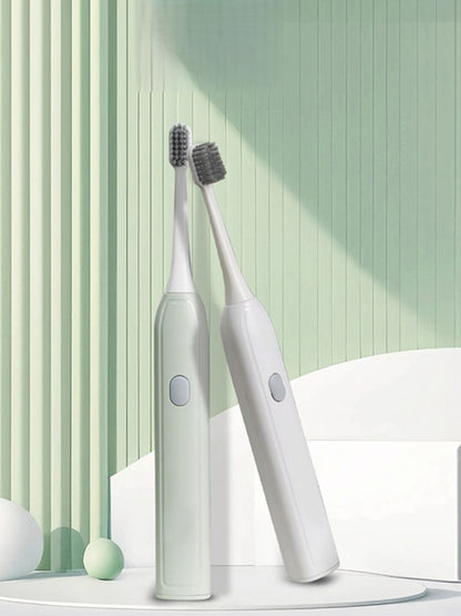 Light green portable electric toothbrush from Trendsi, compact and travel-friendly with a sleek design for effective oral cleaning.