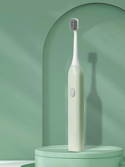 Light green portable electric toothbrush by Trendsi, compact design with brush head and handle visible on white background.