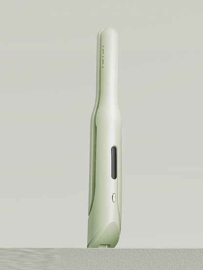 Light green Trendsi cordless rechargeable hair straightener with a sleek design for easy styling.