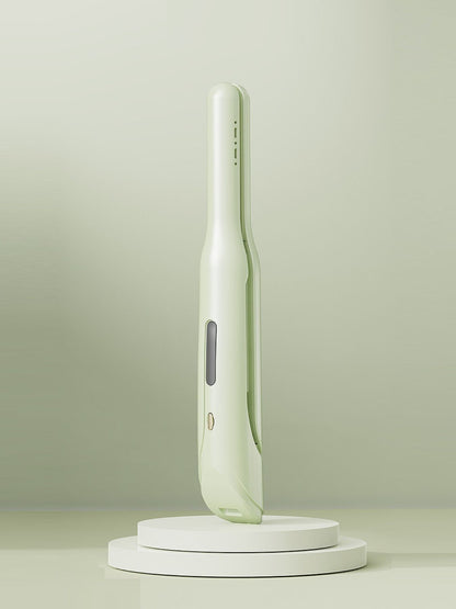 Light green cordless rechargeable hair straightener by Trendsi, showing sleek design and compact size for easy styling.