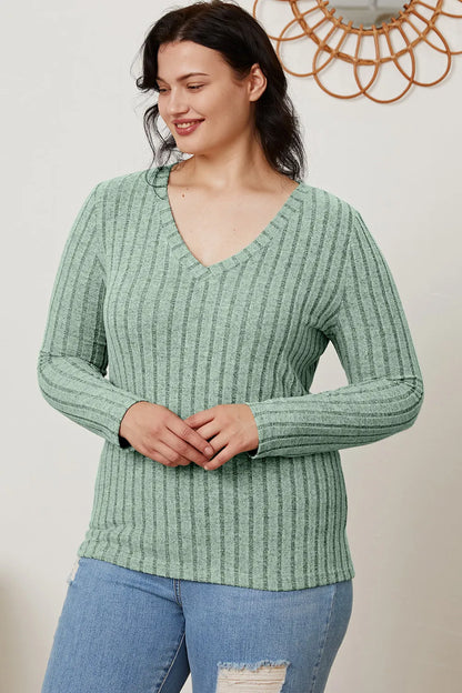 Light green Trendsi Basic Bae ribbed V-neck long sleeve T-shirt, full size, showcasing the fitted design and ribbed texture.
