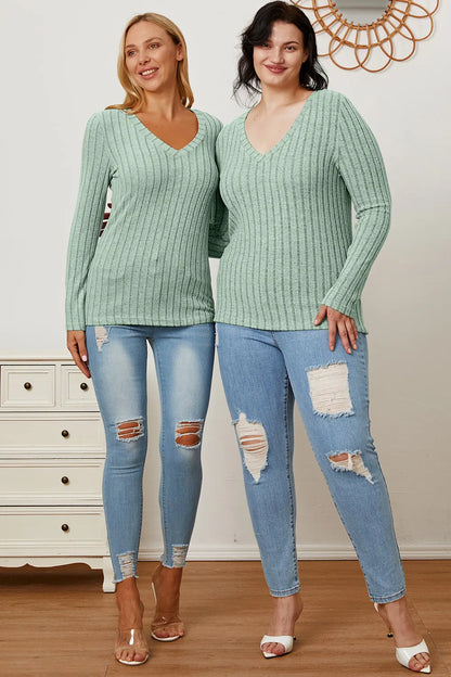 Light green Trendsi Basic Bae ribbed V-neck long sleeve T-shirt, full size, casual fit, soft fabric, close-up of the garment.