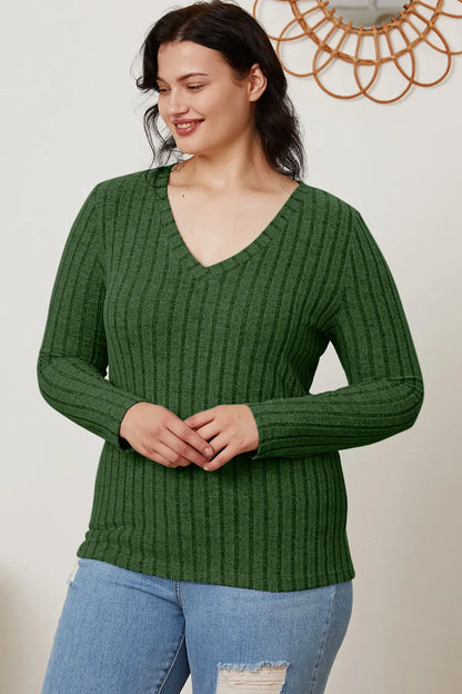 Light green Trendsi Basic Bae full-size ribbed V-neck long sleeve T-shirt displayed on a model, showcasing its fitted ribbed design.