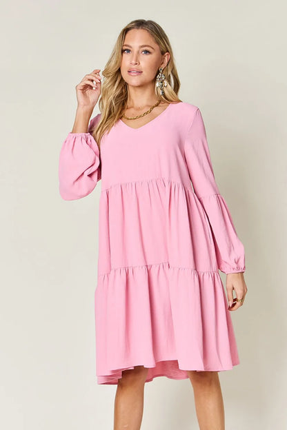 Light green Trendsi double take full-size V-neck balloon sleeve tiered dress with pockets, featuring a relaxed fit and stylish design.