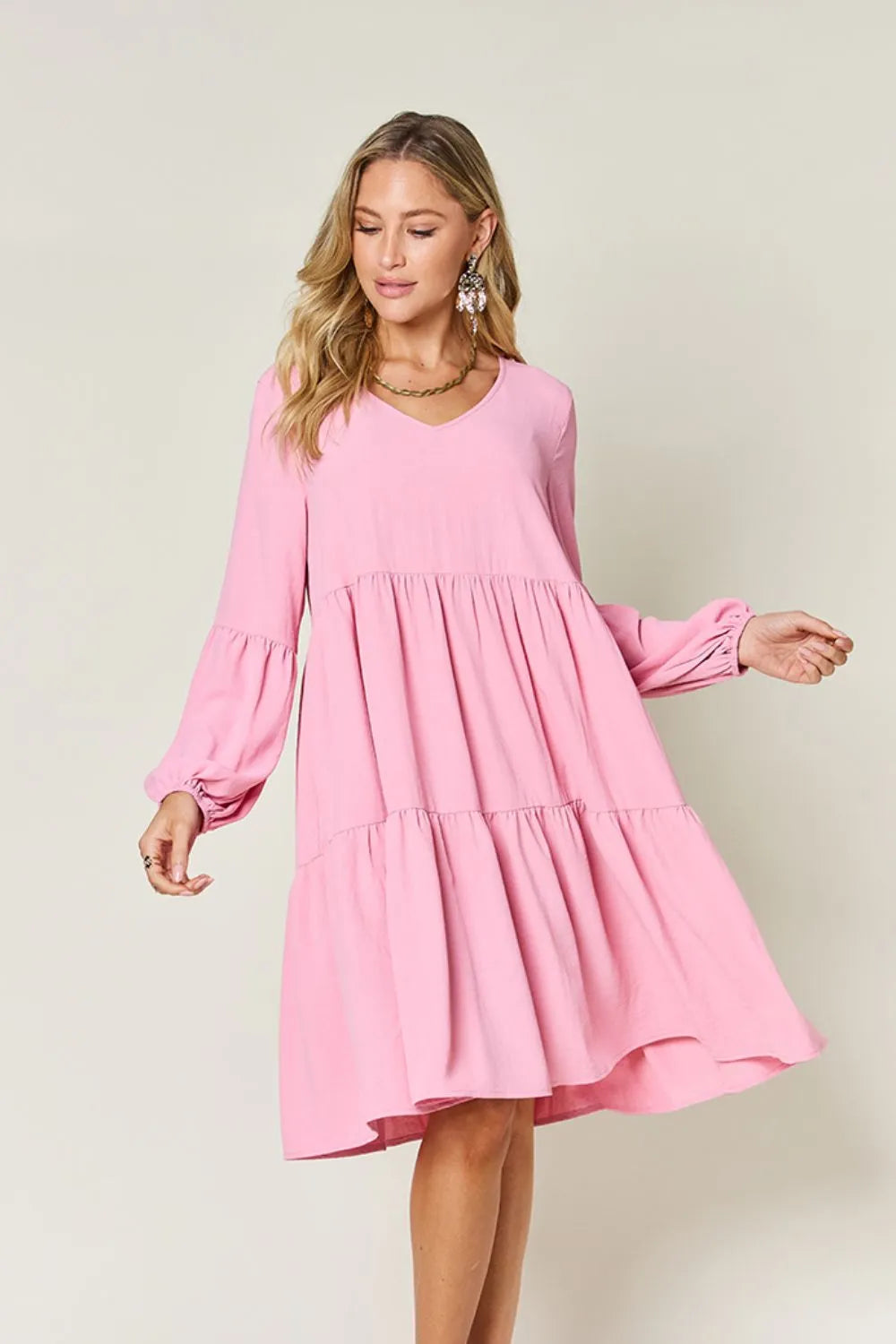 Light green Trendsi Double Take full-size V-neck balloon sleeve tiered dress with pockets, stylish and comfortable for casual wear.