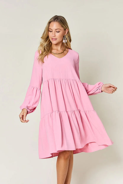 Light green Trendsi Double Take full-size V-neck balloon sleeve tiered dress with pockets, stylish and comfortable for casual wear.