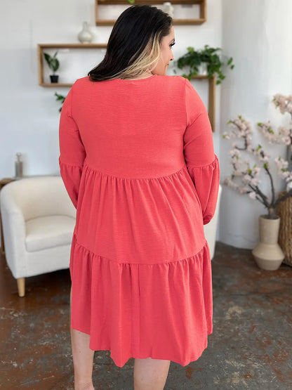 Light green Trendsi Double Take full-size V-neck balloon sleeve tiered dress with pockets, stylish and comfortable for casual wear.
