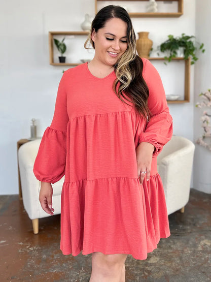 Light green Trendsi Double Take full-size V-neck balloon sleeve tiered dress with pockets, showcasing a stylish and comfortable design.