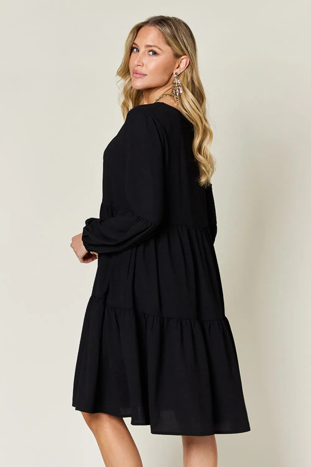 Light green Trendsi Double Take full-size V-neck balloon sleeve tiered dress with pockets, stylish and comfortable for casual wear.