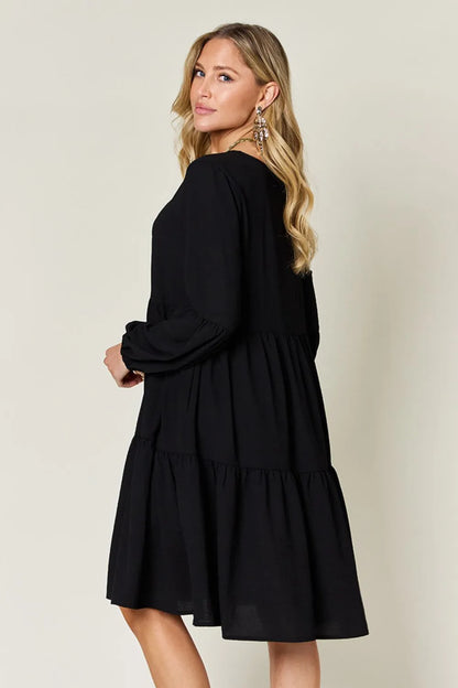 Light green Trendsi Double Take full-size V-neck balloon sleeve tiered dress with pockets, stylish and comfortable for casual wear.
