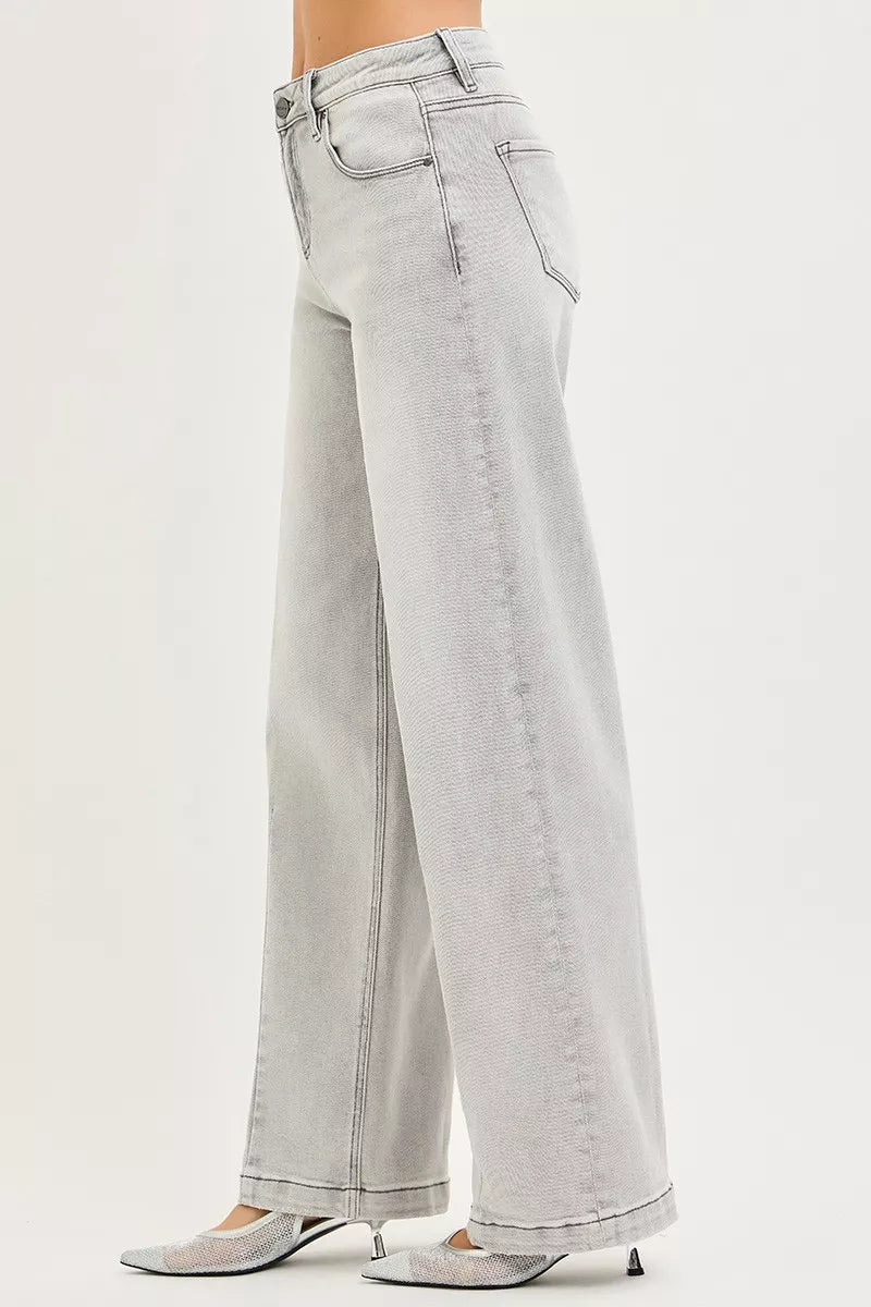 Light grey RISEN slouchy baggy jeans by Trendsi with contrast stitching, relaxed fit, and casual style.