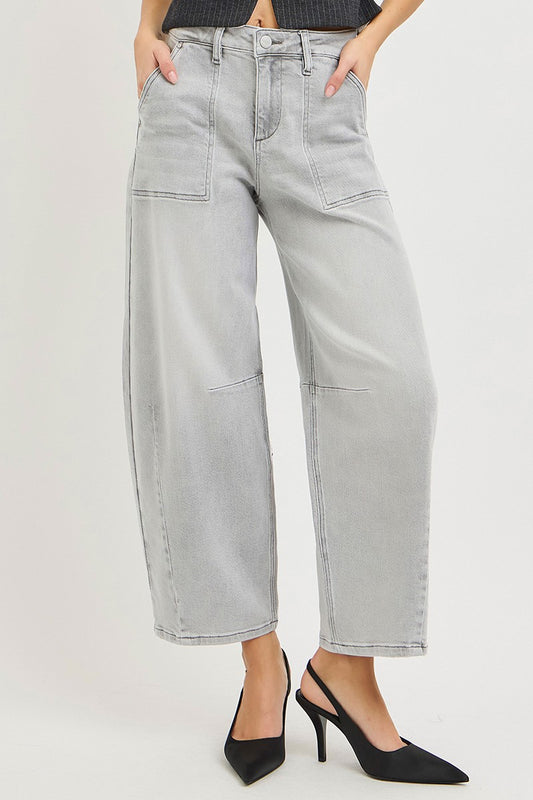 Light grey Risen slouchy cropped barrel jeans with relaxed fit and distressed detailing, styled with casual top and sneakers.