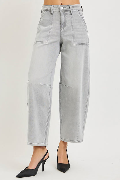 Light grey RISEN slouchy cropped barrel jeans from Trendsi, featuring a relaxed fit and stylish rolled cuffs.