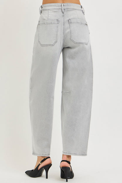 Light grey RISEN slouchy cropped barrel jeans from Trendsi displayed on a model, showing relaxed fit and trendy style.