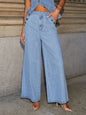 Light wash button decor high-rise wide-leg jeans from Trendsi, featuring a relaxed fit and classic denim style.