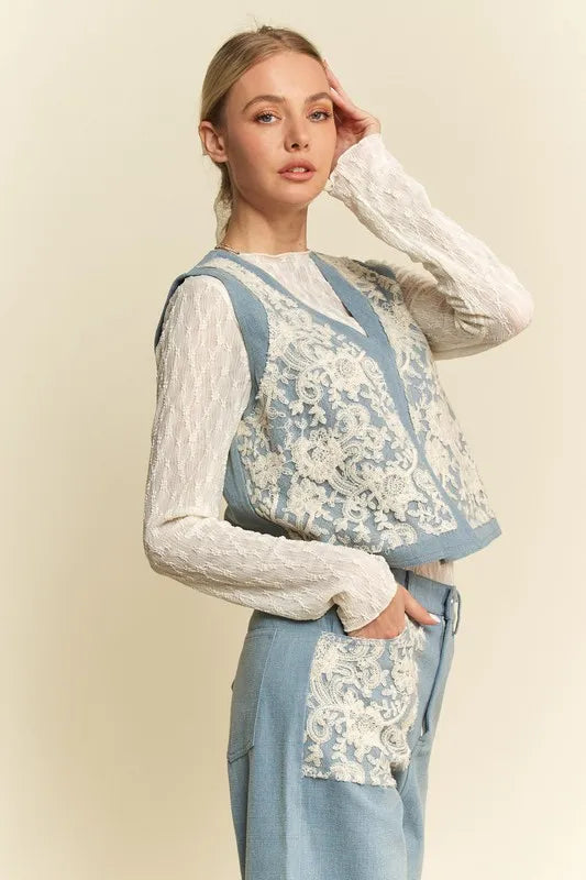 Light blue denim vest with lace patches and open front design by Davi & Dani, styled with casual fashion.