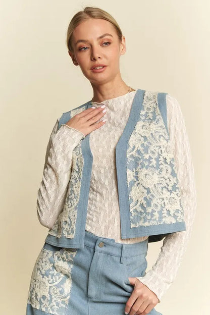 Light blue denim vest with lace patches and open front from Davi & Dani, featuring trendy distressed details and stylish design.