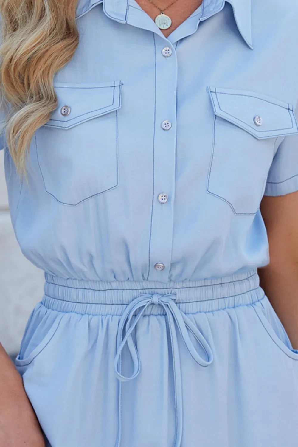Light blue denim dress by Trendsi with drawstring waist, collared neck, and short sleeves, perfect for casual summer wear.