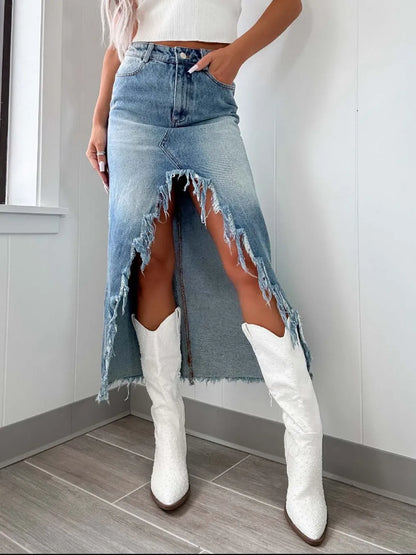 Light wash high-waist raw hem asymmetry denim skirt from Trendsi, showcasing a stylish, modern design with uneven hem and classic denim texture.