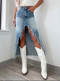 Light wash high-waist raw hem asymmetry denim skirt from Trendsi, showcasing a stylish, modern design with uneven hem and classic denim texture.