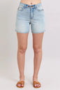 Light blue Judy Blue denim shorts with 2 buttons, pockets, and plus size fit, featuring a casual, relaxed style.