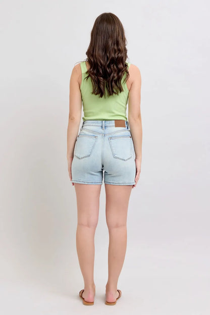 Light blue Judy Blue denim shorts with two buttons and pockets, plus size, featuring a casual fit and stylish design.