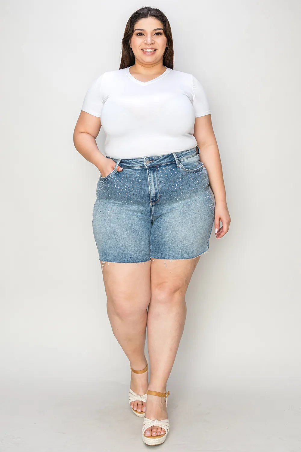 Light blue Judy Blue high waist denim shorts with rhinestone decoration and full size fit, stylish and trendy for casual wear.