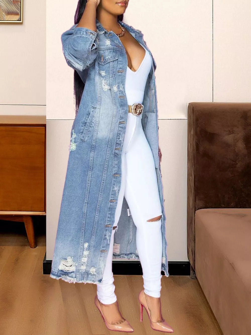 Light blue long sleeve denim jacket with raw hem from Trendsi, featuring classic denim styling and button closure.