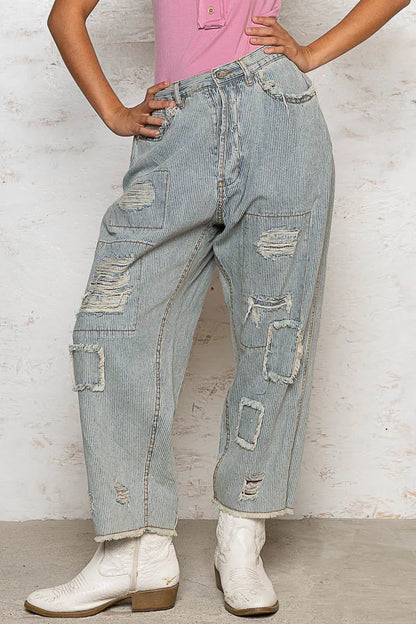 Light-colored POL distressed raw hem wide leg pants from Trendsi, featuring a relaxed fit and casual style.