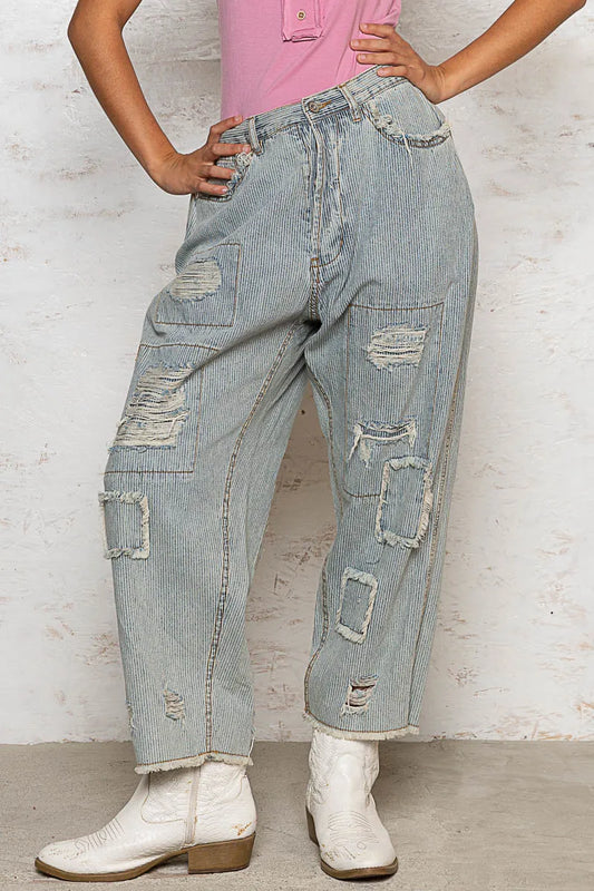 Light-colored POL distressed raw hem wide leg pants from Trendsi, featuring a relaxed fit and casual style.