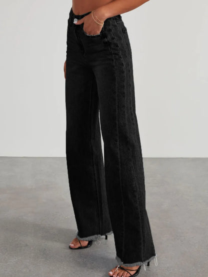 Light wash raw hem wide-leg jeans with pockets from Trendsi, showcasing relaxed fit and casual style.