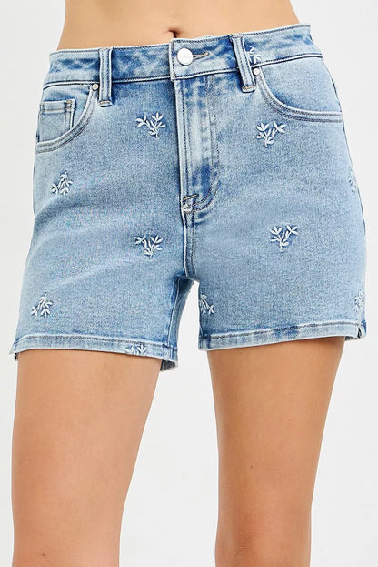 Light blue Risen high-rise denim shorts by Trendsi with embroidered detail and classic five-pocket design.