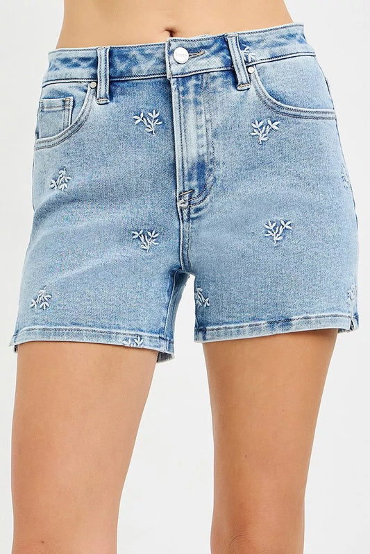 Light blue Risen high-rise denim shorts by Trendsi with embroidered detail and classic five-pocket design.